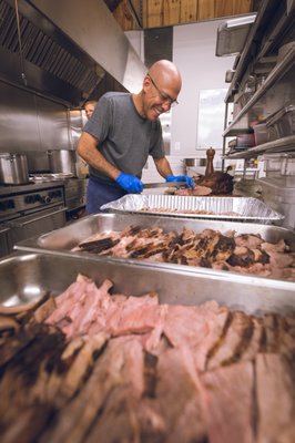 The open kitchen offers a glimpse at the chef & his team in action