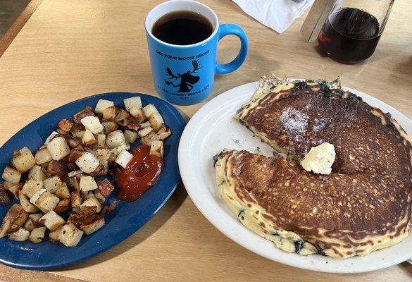 Blueberry pancake and a side of home fries