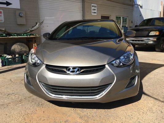 Hood replaced and bumper replaced on this 2013 Hyundai.