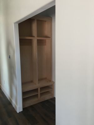 Mudroom/Entry way with beadboard backing.