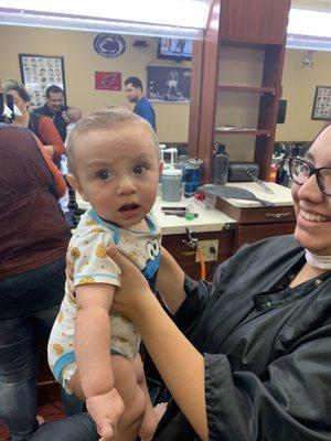 My great nephew getting his first hair cute