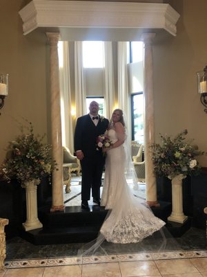 Bride and groom in foyer.