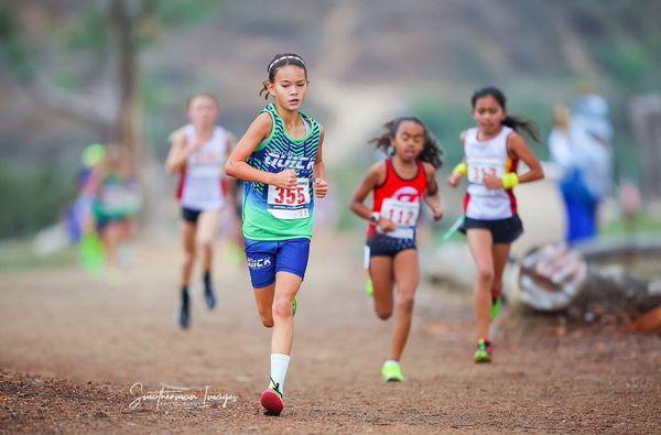 Ella winning the 2023 Region 15 USATF Junior Olympic Championships!