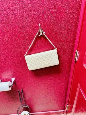 Hook for purse in bathroom