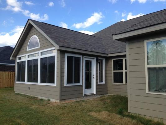 Mary C. needed extra space for her family. We matched the exterior siding, soffit & fascia and shingles so this room looked l...