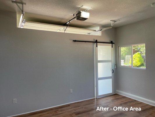 After - Office area with barn door, new outlets, and LVP floor