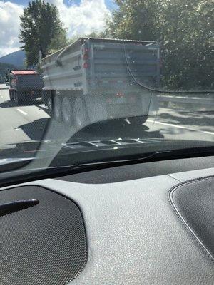 I was trapped between the main car and this trailer full of materials. I almost died.