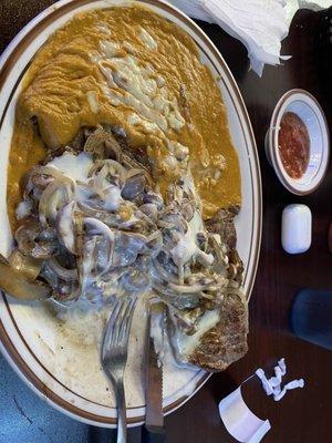 Laredo steak w queso, mushrooms and onions