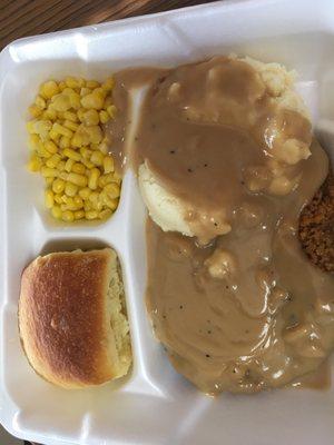 Chicken fried steak mashed potatoes, brown gravy &  corn