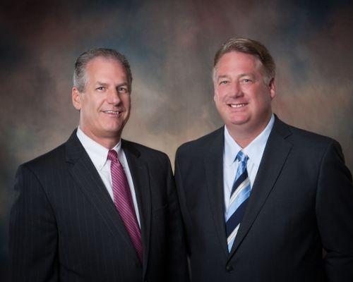 Christopher A. Vinas, CPA, CGMA
  Managing Partner (on right) 
  Neil L. Smith, CPA, CFP 
 (on left)