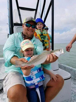 My niece with a pretty trout.