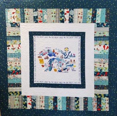 This gorgeous customer quilt features the Great Lakes Panel, surrounded by selections from the Lakeside Story collection.