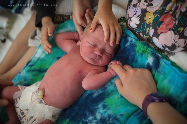 I offer Birth Story photography in your home, birth center, or any area hospitals.  (I'll travel up to two hours)