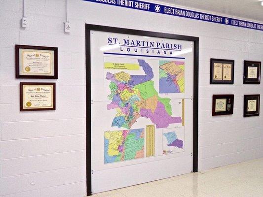 Meeting area in the Brian Douglas Theriot Campaign Headquarters. Map of St. Martin Parish.