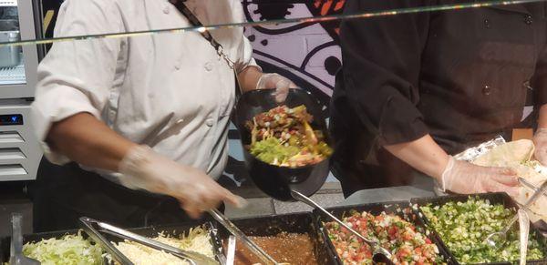 Nachos served in helmet