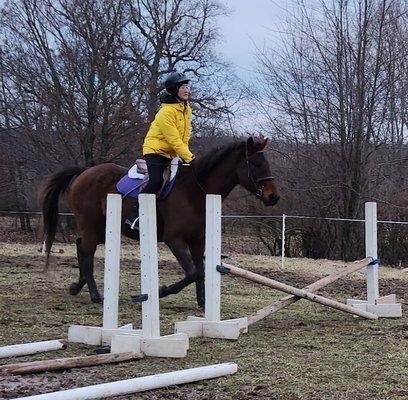 Aurora practicing jumps on a rainy day!