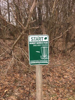 Sign directing to the first hole