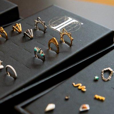 Gold and titanium jewelry options.