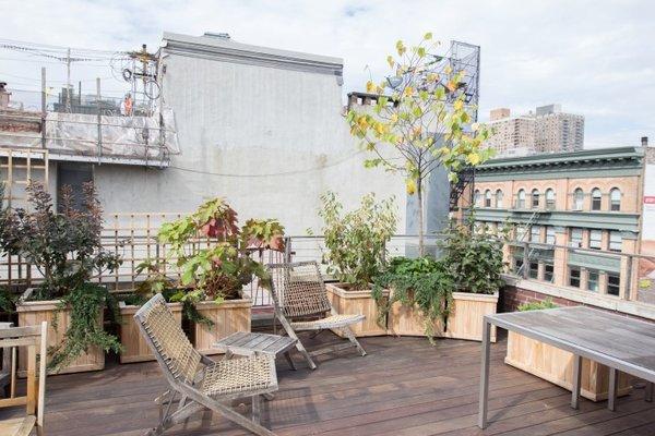 Eclectic Builders installed a new building roof system and custom deck solution for a Bowery NoHo penthouse.