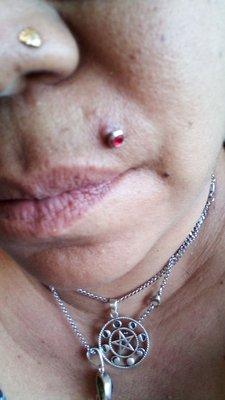 This is a month after the peircing.. Still red, swollen, irritated..