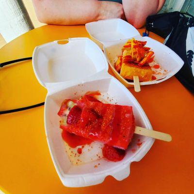 Loco pops with fresh fruit instead of candy: Strawberry paleta with kiwi slice and mango chili paleta.  Yum!