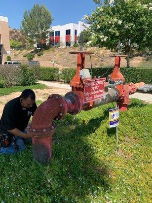 Technician in action working on an OS&Y valve