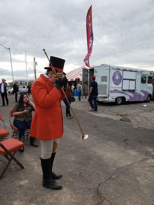 The trumpeter on his way to...trumpet.