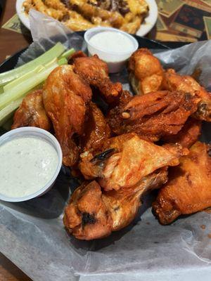 Buffalo wild 12 Piece Classic Wings served with two sides of ranch and celery