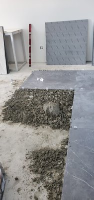 Oversized porcelain tile installation