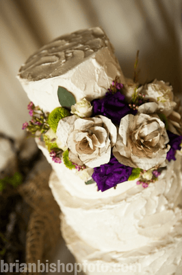 Cake "topper" that wrapped around the cake - they even created paper flowers to match my garden/travel theme!