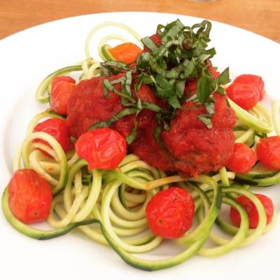 Sun-dried Tomato & Olive Meatballs over Zucchini Noodles with Roasted Tomatoes & Marinara