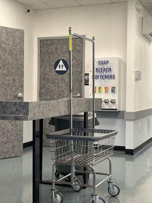 Baskets and laundry detergent dispensers, and a restroom on site