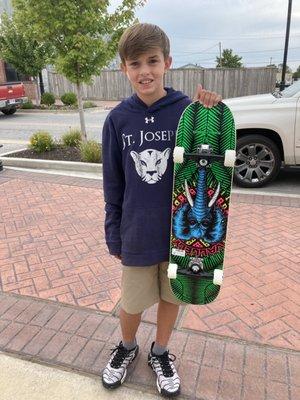 My son and his new board