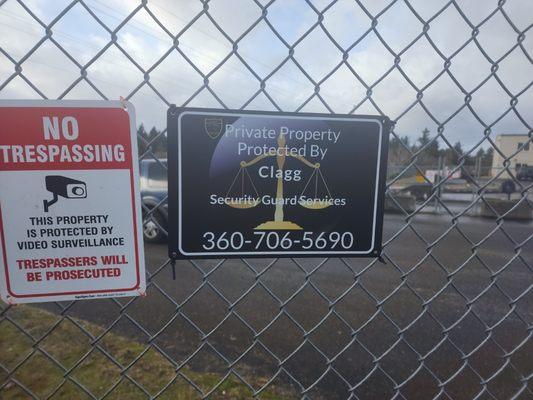 Our sign posted at one of our sites so people are aware that we're protecting the property and an officer is on site. Yelm, WA.