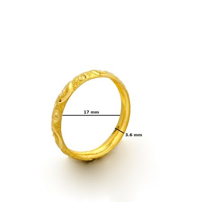 Lady's 22kt gold wedding band.