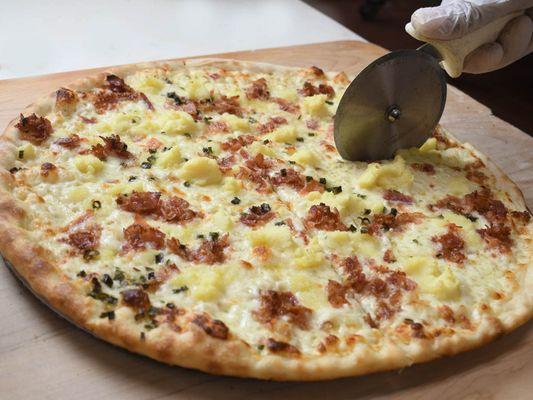 Mashed-Potato Pie with Mashed-Potatoes, Bacon, Garlic, Chives, and Cheese.