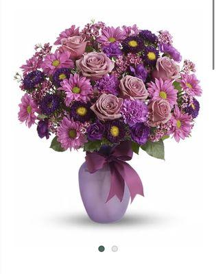 This is the bouquet we ordered & paid for from Marshall Floral & Gift. NOT the bouquet we received.