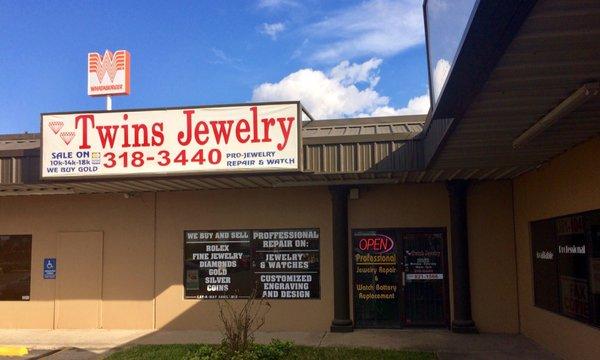 Twins Jewelry outside and sign.   Tucked in the corner of the little strip mall next to Whataburger by the University Dr Walmart.