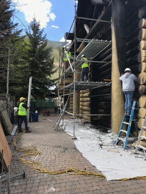 UDK crews setting up scaffolding on a lodge fire project at a ski resort