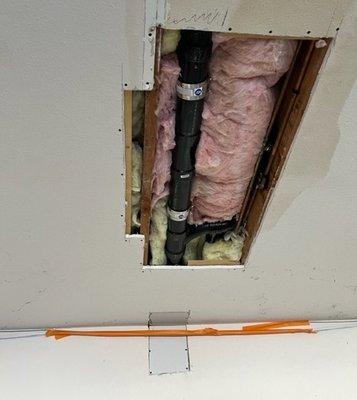 Repair patch on ceiling due to plumbing leak.