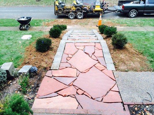 Complete custom flagstone, retaining wall, and steps