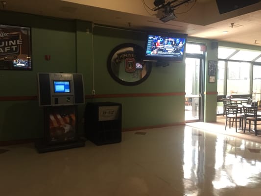 Digital jukebox near the pool table room.