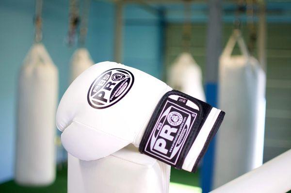 We offer Pro Boxing Gloves & Pro Boxing Wraps in house