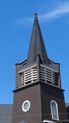 On the top of the United Reformed Church the design made well including the beautiful picture windows