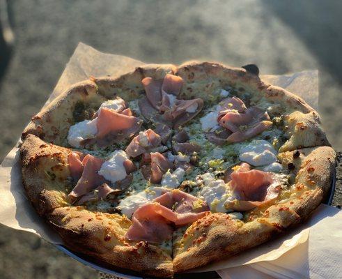 Weekly feature: pesto, mozzarella, pistachio, mortadella, stracciatella, and lemon zest.. pure fire.