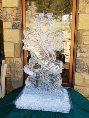 Saint Patrick's themed Wedding ice luge. Artistically shaped stacked shamrocks resembling hearts. Custom designs are our specialty!