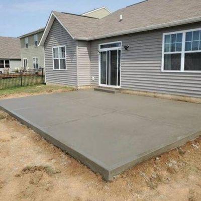 Added a concrete slab in the back of this house