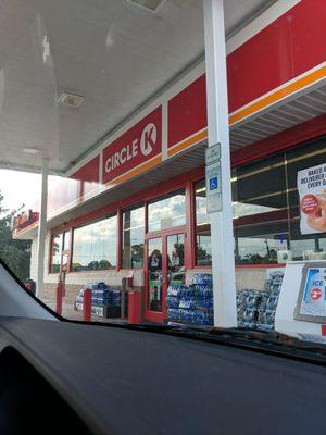 View of the Circle K sign while sitting in a car on a Friday afternoon.