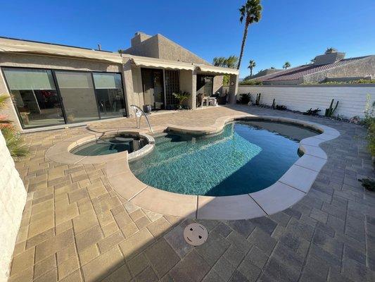 Wall between the spa and pool reconstructed.