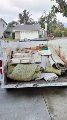 Carpet removal & demolition debris removal and hauled away